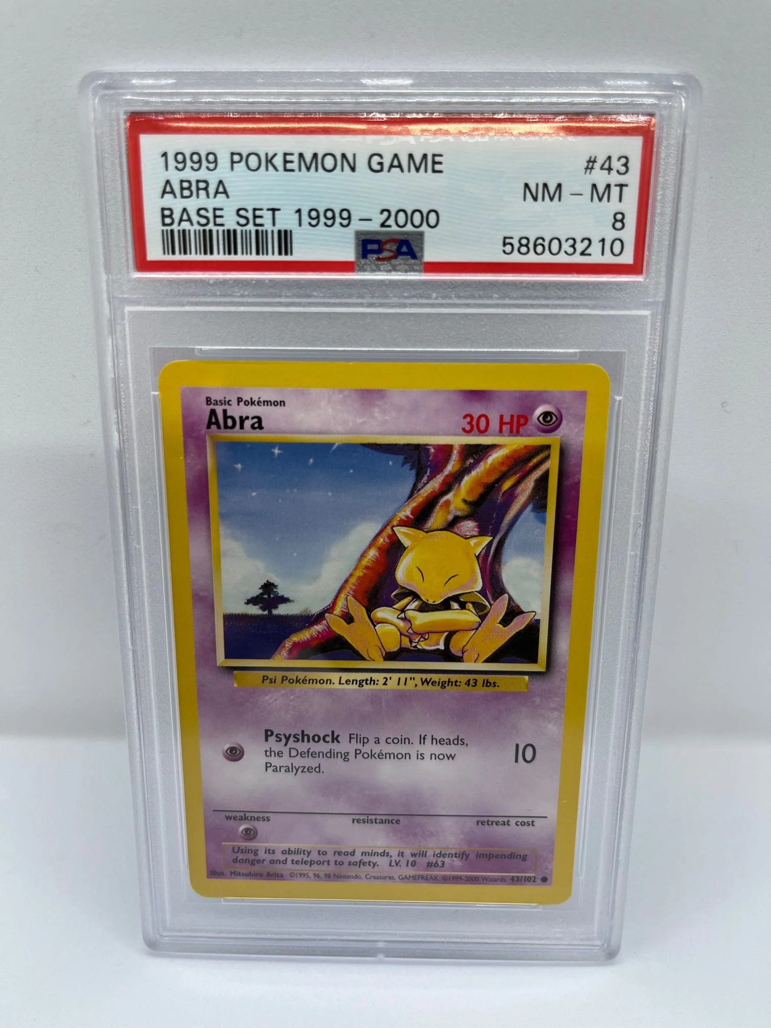 Abra 43/102 PSA 8 Graded Common Pokemon Card (1999 Pokemon Game)
